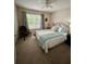 Inviting bedroom featuring ceiling fan, soft color palette, and natural light from the window at 2862 Grasmere View Pkwy, Kissimmee, FL 34746