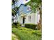 Charming two-story home with blue and white exterior, manicured front yard, and inviting entryway at 2862 Grasmere View Pkwy, Kissimmee, FL 34746