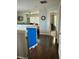 Hallway leading to an office with a clock on the wall at 2862 Grasmere View Pkwy, Kissimmee, FL 34746