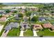 Well-maintained community with houses and green lawns in a peaceful location with lake views at 301 Terranova Blvd, Winter Haven, FL 33884