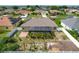 Nice backyard featuring a screened lanai and a partial fence line, providing privacy and outdoor enjoyment at 301 Terranova Blvd, Winter Haven, FL 33884