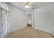 Bedroom with carpet, closet and ceiling fan at 3205 Sabal Palms Ct # A, Kissimmee, FL 34747
