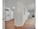 Hallway view of the laundry area, kitchen, and living room at 3205 Sabal Palms Ct # A, Kissimmee, FL 34747