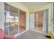 View of the patio leading into two rooms via glass sliding doors at 3205 Sabal Palms Ct # A, Kissimmee, FL 34747