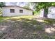 Exterior backyard features a building, shed and grass at 3524 Hage Way, Orlando, FL 32805