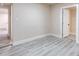 Bedroom features light walls, wood floors, and lots of space at 3524 Hage Way, Orlando, FL 32805