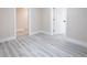 Living room area features light walls and light wood floors at 3524 Hage Way, Orlando, FL 32805