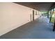 Covered patio with painted cement floor and fenced entry at 3524 Hage Way, Orlando, FL 32805