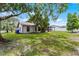 This property boasts a spacious backyard with a screened porch at 3623 Tree Line Way, St Cloud, FL 34769