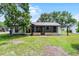 The property features a screened-in porch and backyard at 3623 Tree Line Way, St Cloud, FL 34769