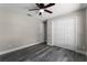 Bedroom features luxury vinyl plank flooring, closet, and neutral paint at 3623 Tree Line Way, St Cloud, FL 34769