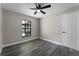 Bedroom features luxury vinyl plank flooring and a window at 3623 Tree Line Way, St Cloud, FL 34769