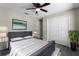 Comfortable bedroom featuring a closet, ceiling fan and calming decor at 3623 Tree Line Way, St Cloud, FL 34769