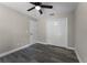 Bedroom features luxury vinyl plank flooring, closet, and neutral paint at 3623 Tree Line Way, St Cloud, FL 34769