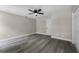 Bedroom features a ceiling fan, closet, fresh paint, and wood flooring at 3623 Tree Line Way, St Cloud, FL 34769