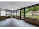 View of the screened porch and the exterior yard at 3623 Tree Line Way, St Cloud, FL 34769