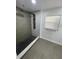 Modern bathroom featuring rainfall shower and tile at 400 Vermont Ave, St Cloud, FL 34769