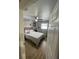 Cozy bedroom with a comfortable bed, ceiling fan, and window providing natural light at 400 Vermont Ave, St Cloud, FL 34769