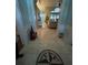Inviting foyer with tile flooring, decorative inlays, and view into the living space at 4820 Wingrove Blvd, Orlando, FL 32819
