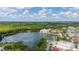 Beautiful aerial view overlooking community, lake, and shopping center, perfect location and nearby amenities at 502 Mirasol Cir # 103, Kissimmee, FL 34747
