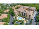 Charming condo community with a sparkling pool, lush landscaping, and ample parking at 502 Mirasol Cir # 103, Kissimmee, FL 34747