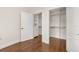 Bedroom boasts a walk-in closet with custom shelving and a standard closet at 502 Mirasol Cir # 103, Kissimmee, FL 34747
