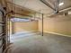 Spacious two car garage with high ceilings and an open garage door at 502 Mirasol Cir # 103, Kissimmee, FL 34747
