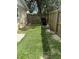 Cozy backyard with green grass and a wooden fence at 5449 Nw 2Nd St, Ocala, FL 34482