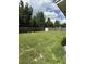 Huge, grassy backyard featuring a wooden fence at 5449 Nw 2Nd St, Ocala, FL 34482