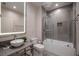 Bright bathroom with a modern vanity, tub-shower combo, and sleek finishes at 5573 Torino Rd, Kissimmee, FL 34746