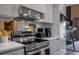 Modern kitchen features stainless steel appliances, sleek countertops, and ample cabinet space for efficient cooking at 5573 Torino Rd, Kissimmee, FL 34746