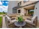 Cozy patio featuring comfortable seating and an outdoor dining setup for relaxation at 5573 Torino Rd, Kissimmee, FL 34746