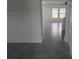 Open-concept living space with tile flooring and staircase, perfect for modern living at 5793 Gingham Dr, Kissimmee, FL 34758