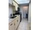 Well-equipped kitchen with sleek appliances, ample counter space, and bright lighting at 5861 La Costa Dr # 115, Orlando, FL 32807