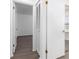 Hallway leading to bedroom, with closet and doors at 840 Center Ave # 80, Daytona Beach, FL 32117