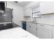 Bright kitchen with new cabinets, stainless steel appliances and stone countertops at 840 Center Ave # 80, Daytona Beach, FL 32117