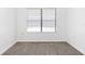 Bright room with a large window featuring horizontal blinds at 840 Center Ave # 80, Daytona Beach, FL 32117