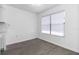 Bright room featuring wood-look flooring and a window for natural light at 840 Center Ave # 80, Daytona Beach, FL 32117