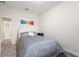 Cozy bedroom features soft carpeting, neutral wall paint, and a serene, calming atmosphere at 8990 Ace Loop, Champions Gate, FL 33896