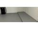 Unfinished basement with concrete walls and painted floors awaiting your creative design at 124 Cinnamon Dr, Orlando, FL 32825