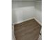 Walk-in closet with hardwood floors, white trim, and plenty of storage space at 124 Cinnamon Dr, Orlando, FL 32825