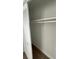 Walk-in closet boasts ample storage with shelf and louvered sliding doors at 124 Cinnamon Dr, Orlando, FL 32825