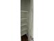 Linen closet featuring multiple shelves for storage at 124 Cinnamon Dr, Orlando, FL 32825