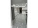 Bright kitchen featuring white marble flooring, updated cabinets, and new appliances at 124 Cinnamon Dr, Orlando, FL 32825