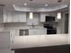 Modern kitchen with stainless steel appliances, quartz countertops, and stylish lighting at 124 Cinnamon Dr, Orlando, FL 32825
