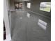 Spacious room featuring tile flooring, natural lighting and views of the backyard at 124 Cinnamon Dr, Orlando, FL 32825