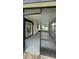 Screened in patio featuring a covered space with access to the backyard and house at 124 Cinnamon Dr, Orlando, FL 32825