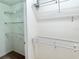 Walk-in closet with wire shelving providing ample storage space for organization at 162 Seneca Point Trl, Kissimmee, FL 34746