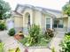 Charming single-Gathering home with lush landscaping and a welcoming front entrance at 162 Seneca Point Trl, Kissimmee, FL 34746