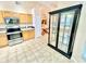 Functional kitchen with stainless steel appliances and a clear view of a built-in hutch at 162 Seneca Point Trl, Kissimmee, FL 34746
